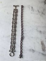 Both bracelets side by side showing full length and clasp styles