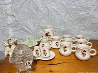 Full lot showing ceramic rose set, green bowl, glass egg, bird figurine