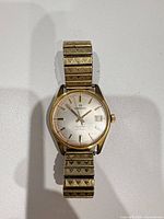 Front view of Ermano watch showing case, dial, and bracelet