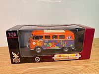 Front view of boxed 1:18 Volkswagen Microbus model