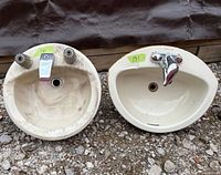 Both sinks side by side showing overall condition and faucets