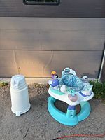 Exersaucer and diaper genie together