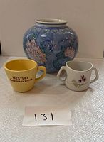 Group shot with vase, Nestle mug, Limoges cup