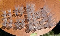 All crystal glasses laid out on table