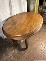 Top view of oval wooden coffee table