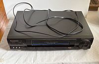 Front view showing model, controls, input jacks and overall condition
