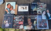 Overhead view of nine books laid out on table displaying front covers and titles