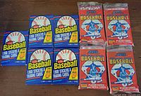 All nine sealed 1988 Fleer and Score baseball card packs on table