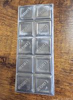 Front view of the metal mold showing ten HERSHEY’S segments