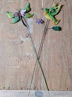 Both garden stakes full length