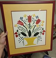 Front view of framed floral print showing artwork, matting and frame