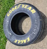 Top view of Goodyear Eagle racing slick tire showing yellow branding