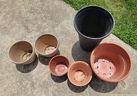Top view of all six planters showing interiors and relative sizes