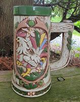 front view showing raised rooster design and colours