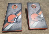 Top view of both cornhole boards showing graphics and condition