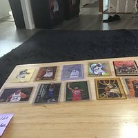 Overview of ten basketball cards laid out on table