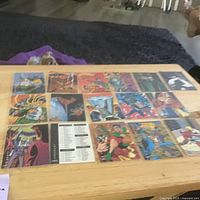 Overview of all Batman trading cards laid out on table