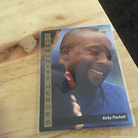 Front of 1992 Upper Deck Community Heroes Kirby Puckett card in sleeve