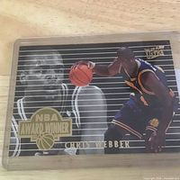 Front of 1994 Fleer Ultra NBA Award Winner Chris Webber card in holder