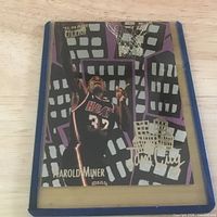 Front view of Harold Miner Jam City insert card in holder