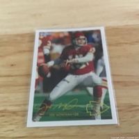 Front view of Joe Montana card showing image, gold signature and Chiefs logo