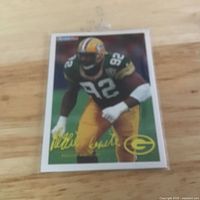 Front of Reggie White trading card in sleeve