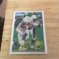 Front of 1994 Fleer Terry Kirby card with gold signature