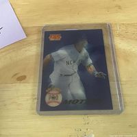 Front view of 1995 Pinnacle Pro Motion Don Mattingly card in plastic case