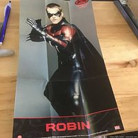 Full view of folded Robin poster with logo and title visible