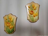 Both DevonWare tulip wall plaques front view