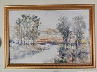 Front view of framed landscape canvas art
