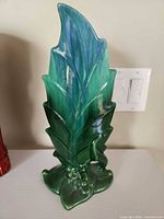 front view of ceramic leaf-form vase
