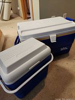 Front view of both coolers showing size difference and color