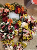Two wreaths showing overall design and color mix