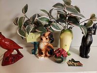 Group shot of five ceramic and porcelain items