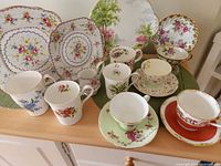 Group shot of all teacups, saucers and plates