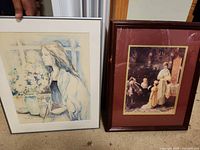 Both framed DeWitt prints side by side