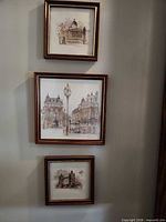 All three framed prints shown together on wall