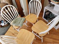 Four Windsor chairs showing overall style and finish