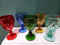 Front view of all five multicolor goblets