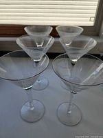 Group view of six martini glasses front angle