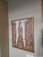 Full view of framed artwork on wall