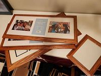Stack of oak frames showing collage and single styles