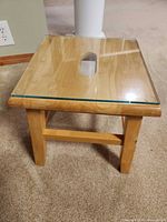 Overall view of stool with glass top in place