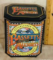 Front view showing Bassett's Liquorice Allsorts graphics and ruler for scale