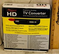 Front of Access HD TV converter retail box