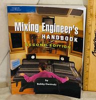 Front cover showing title, author, edition, and image of mixing console