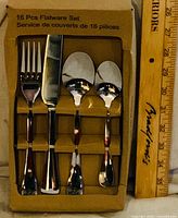 Front view of boxed flatware showing utensils and count