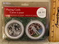 Front of sealed package showing both decks and product labeling