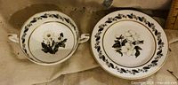 Top view of cup and saucer showing floral design and gold trim